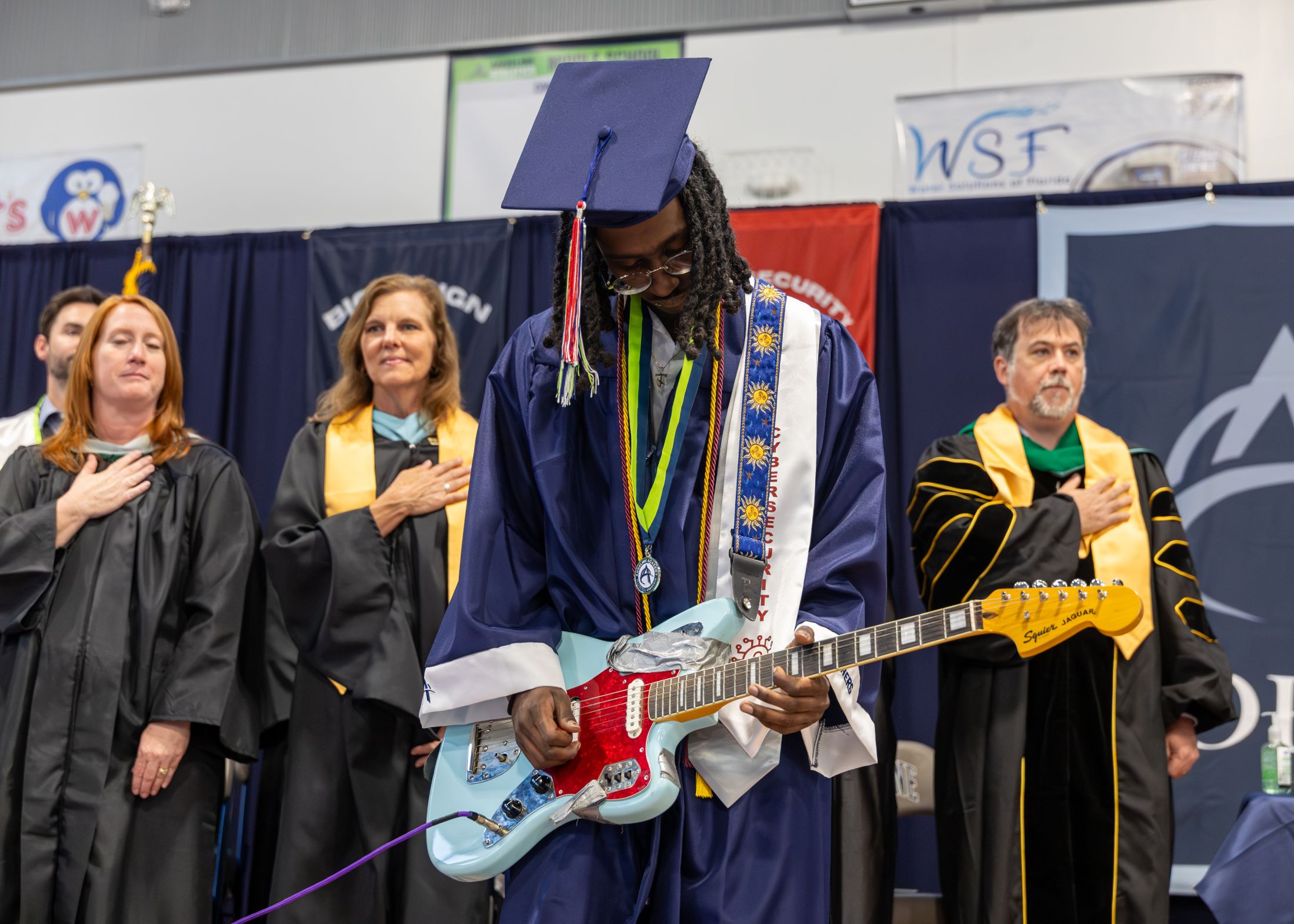 student playing guitar - 