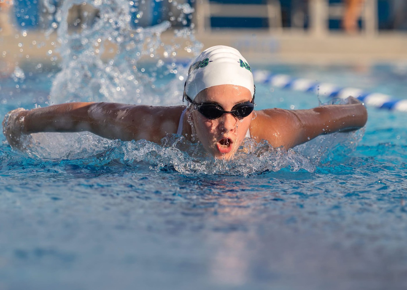 Person swimming - <p>Photos from our recent swim meet with Cypress Creek High School.</p>