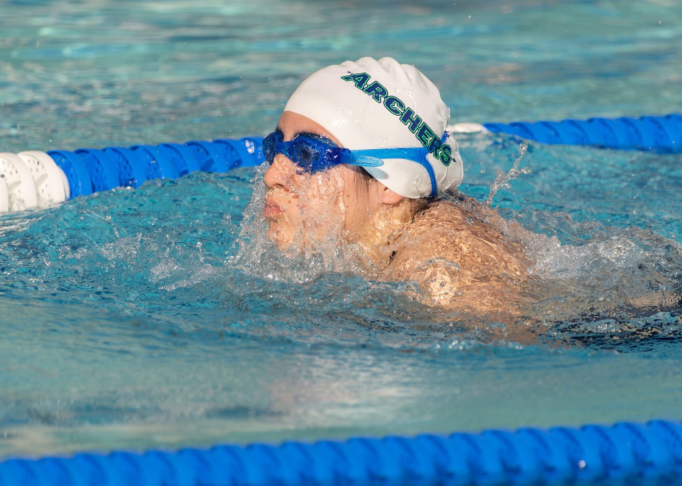 Person swimming - <p>Photos from our recent swim meet with Cypress Creek High School.</p>