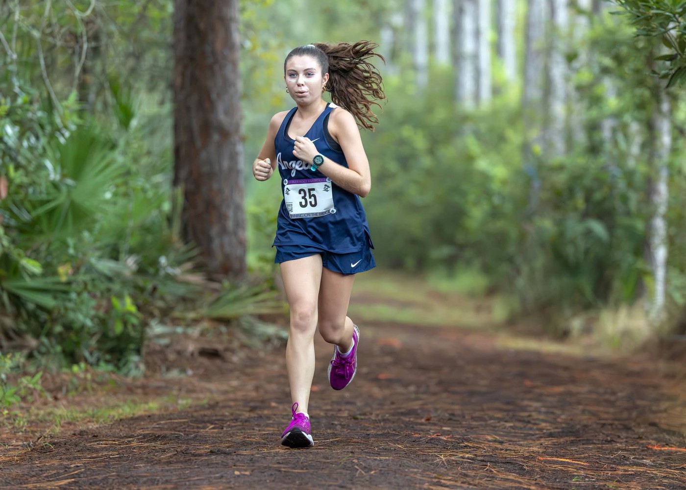 Student running. - <p>Photos from our recent cross country meet at River Ridge High School.</p>
